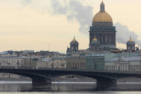 Historic canal and cathedral in St. Petersburg, Russia, reflecting the 19th-century setting of Gogol’s The Overcoat.