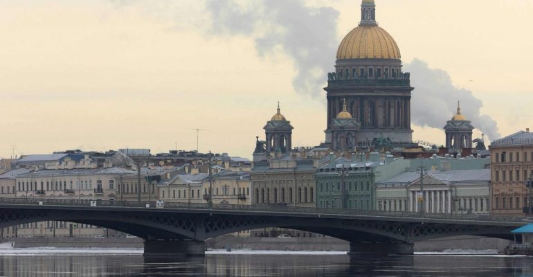 Historic canal and cathedral in St. Petersburg, Russia, reflecting the 19th-century setting of Gogol’s The Overcoat.